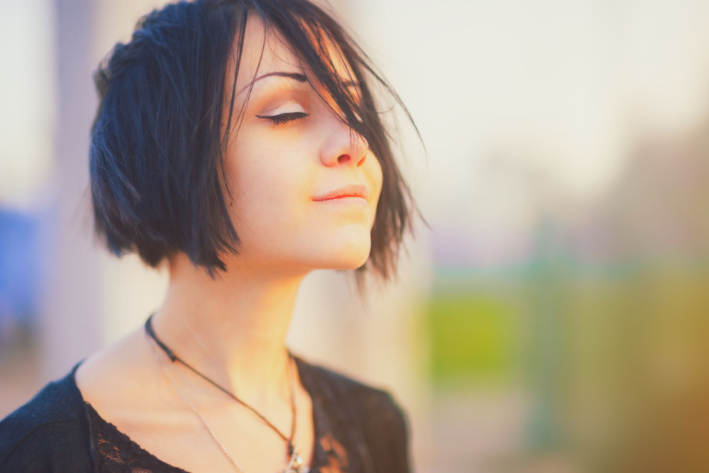 Image of relaxed young woman due to cognitive behavioral therapy techniques
